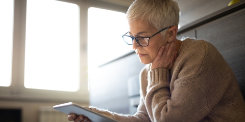 Woman looking at a tablet